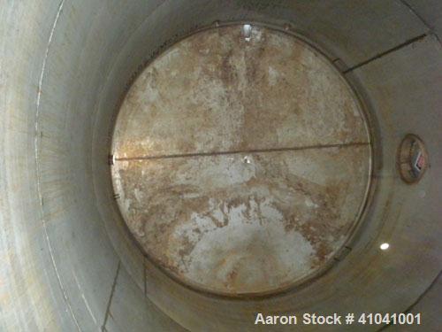 Used Evans & Sons Process Tank Company Tank, 12,000 gallon, 316 stainless steel, vertical. 132" diameter x 216" straight side, flat top and bottom. Internal rated atmospheric at 200 degrees F. Openin...