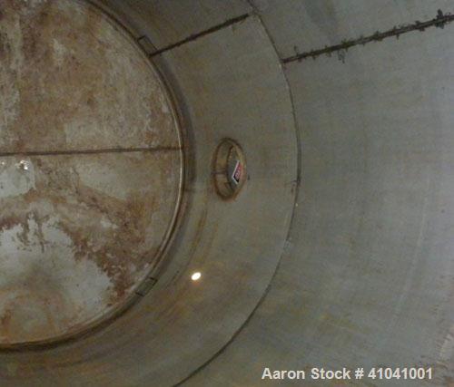 Used Evans & Sons Process Tank Company Tank, 12,000 gallon, 316 stainless steel, vertical. 132" diameter x 216" straight side, flat top and bottom. Internal rated atmospheric at 200 degrees F. Openin...