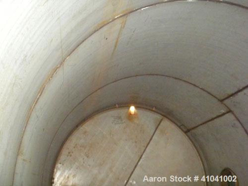 Used Evans & Sons Process Tank Company Tank, 12,000 Gallon, 316 Stainless Steel, Vertical. 132" diameter x 216" straight side, flat top and bottom. Internal rated atmospheric at 200 deg.f.. Openings ...