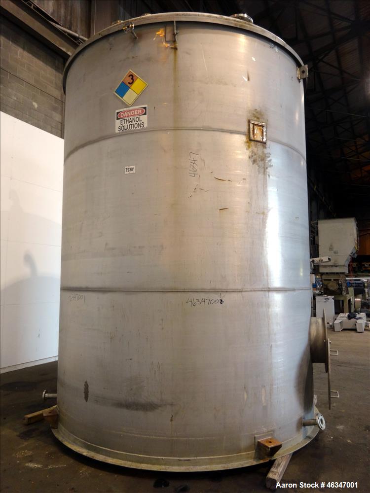Used Evans & Sons Tank, 9000 Gallon, 316 Stainless Steel, Vertical. Approximate 126” diameter x 168” straight side, flat top and bottom. Internal atmospheric at 150 degrees F. Openings top (2) 2”, (3...