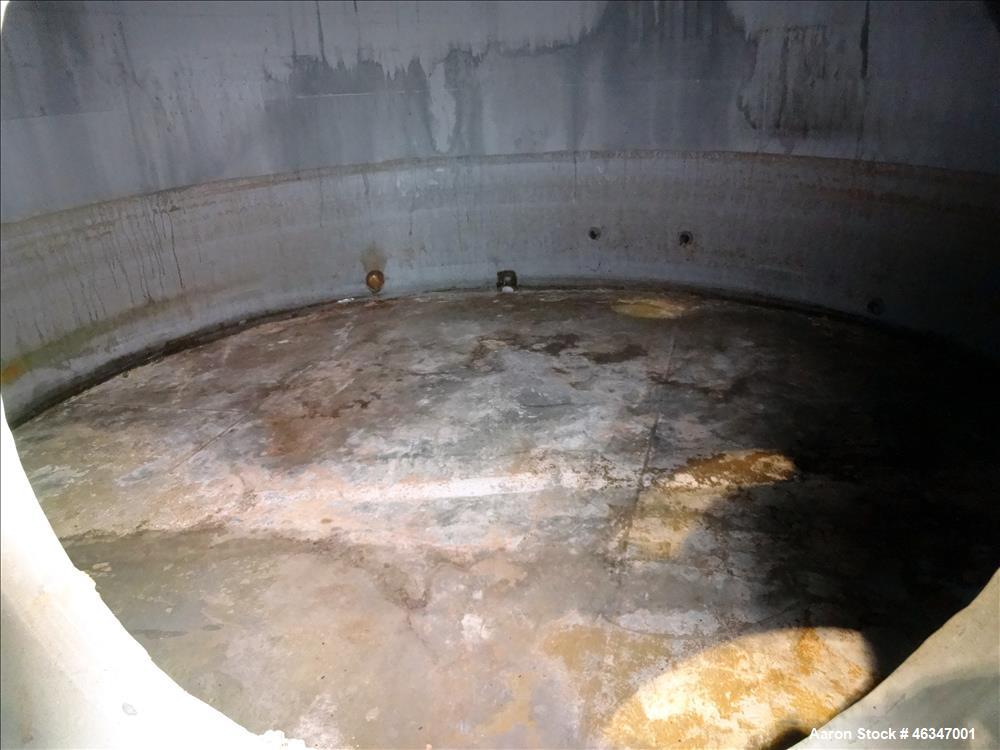 Used Evans & Sons Tank, 9000 Gallon, 316 Stainless Steel, Vertical. Approximate 126” diameter x 168” straight side, flat top and bottom. Internal atmospheric at 150 degrees F. Openings top (2) 2”, (3...