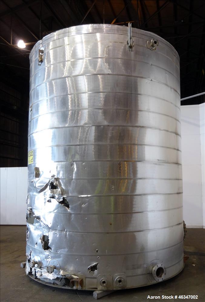 Used Evans & Sons Tank, 9000 Gallon, 316 Stainless Steel, Vertical. Approximate 126” diameter x 168” straight side, flat top and bottom. Internal atmospheric at 150 degrees F. Openings top 2”, (4) 4”...