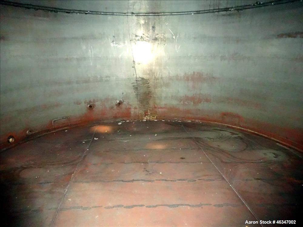 Used Evans & Sons Tank, 9000 Gallon, 316 Stainless Steel, Vertical. Approximate 126” diameter x 168” straight side, flat top and bottom. Internal atmospheric at 150 degrees F. Openings top 2”, (4) 4”...
