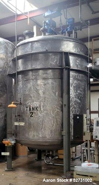 Used Tank, Expert Industries, 5000 Gallon Stainless steel, Vertical, 10'2" diameter x   18'8" straight side. With top mounted agitator.Rated 18 psi @  320 deg F. S/n 374, Yr. 1976.