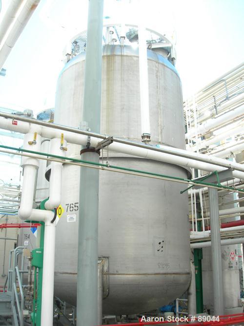 USED: Fabricated Products tank, 9000 gallon, 316L stainless steel, vertical. Approximately 10' diameter x 14' straight side, 2:1 elliptical top and bottom. Internal rated FV and 15 psi at 200 deg F. ...