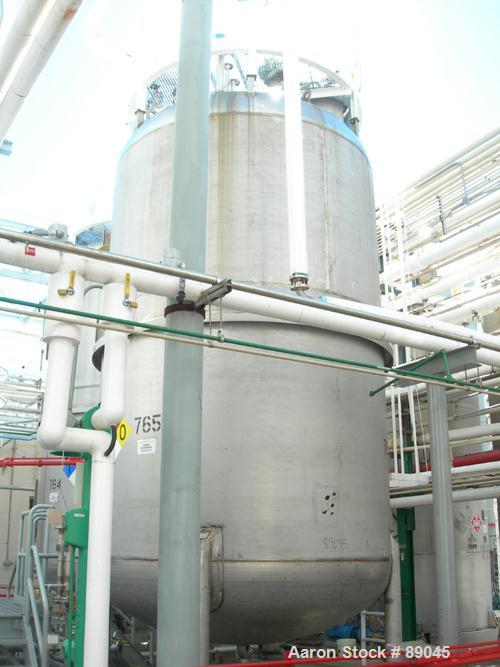 USED: Fabricated Products tank, 9000 gallon, 316L stainless steel, vertical. Approximately 10' diameter x 14' straight side, 2:1 elliptical top and bottom. Internal rated FV and 15 psi at 200 deg F. ...