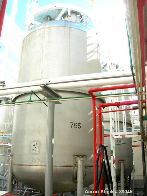 USED: Fabricated Products tank, 9000 gallon, 316L stainless steel, vertical. Approximately 10' diameter x 14' straight side, 2:1 elliptical top and bottom. Internal rated FV and 15 psi at 200 deg F. ...