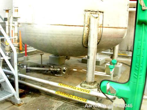 USED: Fabricated Products tank, 9000 gallon, 316L stainless steel, vertical. Approximately 10' diameter x 14' straight side, 2:1 elliptical top and bottom. Internal rated FV and 15 psi at 200 deg F. ...