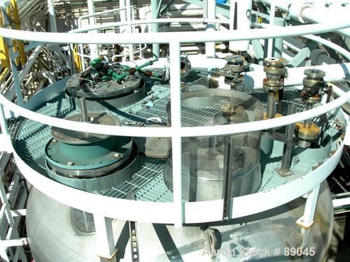 USED: Fabricated Products tank, 9000 gallon, 316L stainless steel, vertical. Approximately 10' diameter x 14' straight side, 2:1 elliptical top and bottom. Internal rated FV and 15 psi at 200 deg F. ...