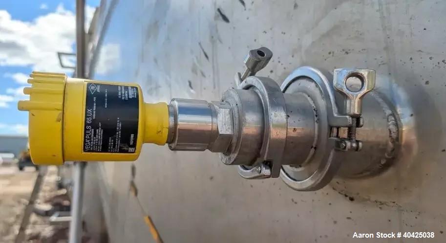 Used Feldmeier 12,000 Gallon Storage Tank. 316 stainless steel construction. Approximately 136" inner diameter x 180"straight side, dish top and bottom, 20" top manway, 3" center bottom outlet. Mount...
