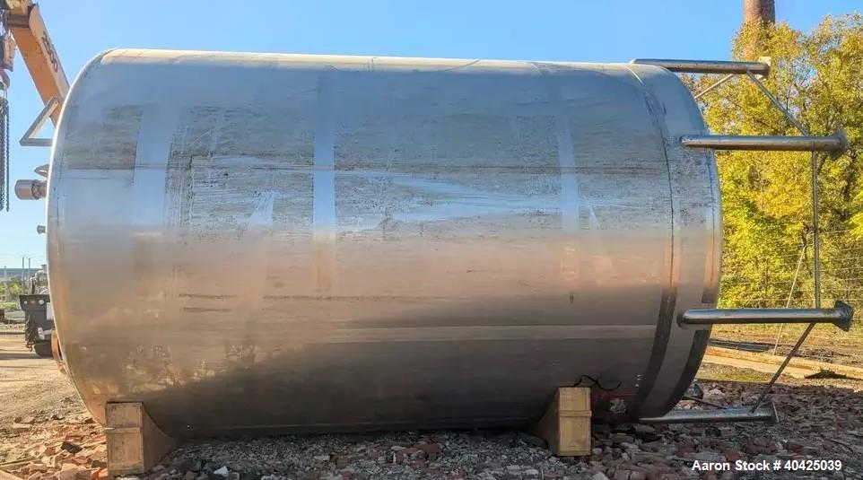 Used Feldmeier 12,000 Gallon Storage Tank. 316 stainless steel construction. Approximately 136" inner diameter x 180"straight side, dish top and bottom, 20" top manway, 3" center bottom outlet. Mount...