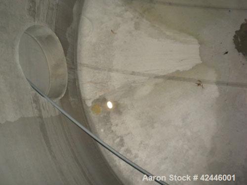 Used Feldmeier Equipment Tank, 6000 gallon, 304L stainless steel, vertical. 144" Diameter x 87" straight side, flat top, dished bottom. Internal rated  -20 to 125 deg F. Openings: top 3/4", 2", (2) 3...