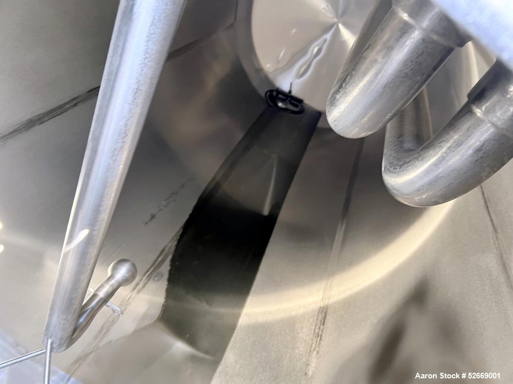 Used Feldmeier Single Wall Tank, 6,000 Gallon, 304 Stainless Steel, Vertical.  Approximate 90" diameter x 228" straight side. Dished top, sloped bottom (3/4" per foot pitch). Alcove with 16" x 20" ma...