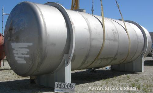 USED: Fesco tank, 20,000 gallon, 304 stainless steel, horizontal. Approximate 120" diameter x 384" straight side. Dished heads. Internal rated 0 psi at 180 deg F. Openings: top (1) 24" manway with co...