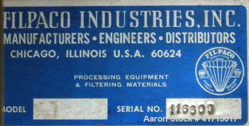 Used Filpaco Industries Tank, Approximate 6,000 Gallon, 304 Stainless Steel, Vertical.  Approximate 114" diameter x 132" straight side, slight cone top, slight dish bottom.  Top openings:  20" manway...