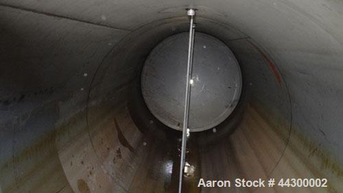 Used Hamilton Welding Company Tank, 11,000 Gallon, 304 Stainless Steel, Horizontal. Approximate 96” Diameter x 330” straight side, dished heads. Openings top 24” man way with cover, 3” side bottom ou...