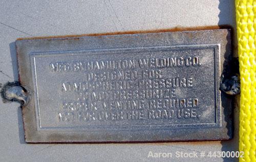 Used Hamilton Welding Company Tank, 11,000 Gallon, 304 Stainless Steel, Horizontal. Approximate 96” Diameter x 330” straight side, dished heads. Openings top 24” man way with cover, 3” side bottom ou...