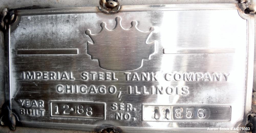 Used Imperial Steel Tank, 10,000 Gallon, 304 Stainless Steel, Vertical. 120" Diameter x 192" straight side, dished top and bottom. Openings top (2) 2", 3", 4", approximate 18" man way with cover. 23"...