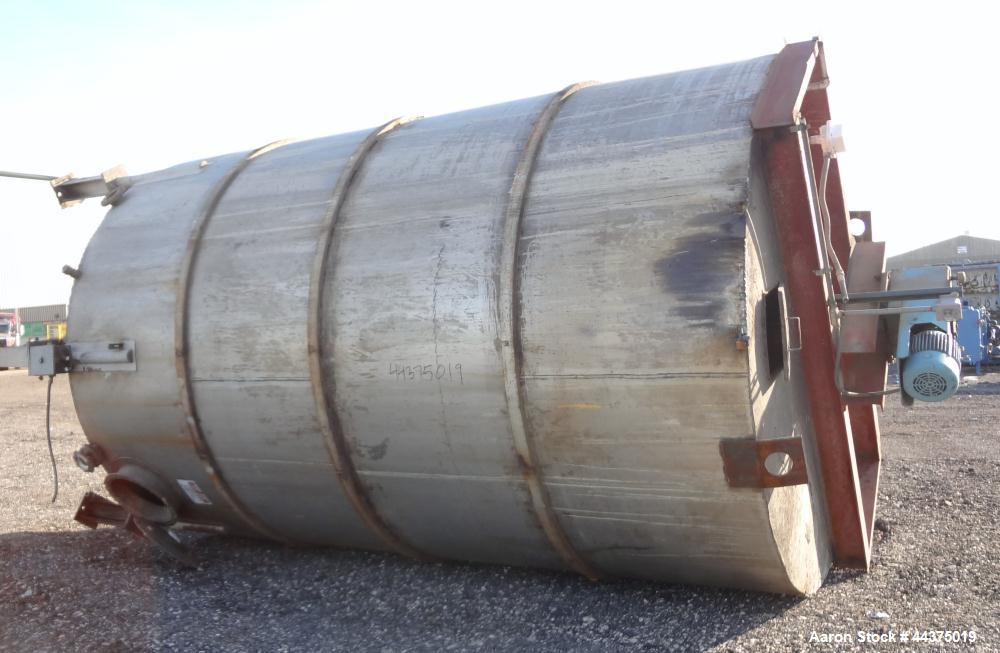 Used Tank, 10,500 Gallon, 304 Stainless Steel, Vertical. Approximate 126" diameter x 192" straight side, flat welded top, slight dished bottom. Fixed carbon steel agitator bridge with a Chemineer agi...