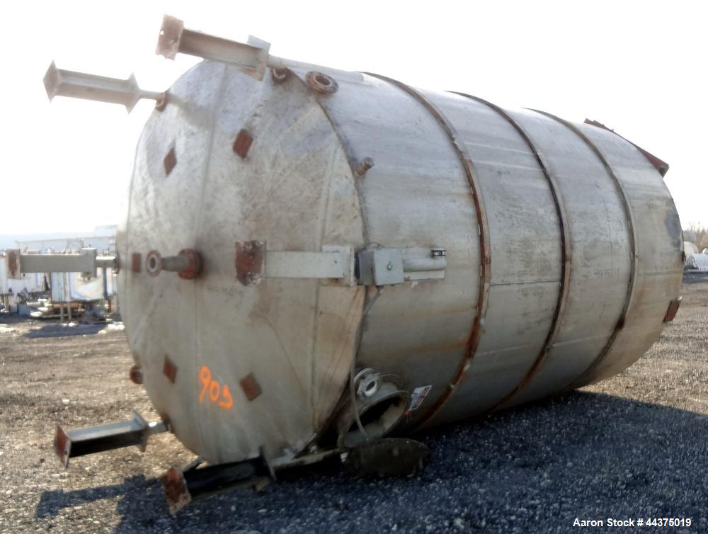 Used Tank, 10,500 Gallon, 304 Stainless Steel, Vertical. Approximate 126" diameter x 192" straight side, flat welded top, slight dished bottom. Fixed carbon steel agitator bridge with a Chemineer agi...