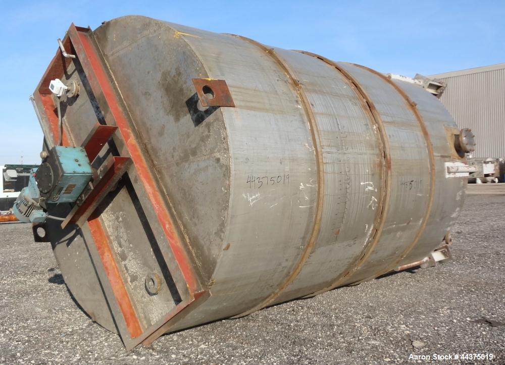 Used Tank, 10,500 Gallon, 304 Stainless Steel, Vertical. Approximate 126" diameter x 192" straight side, flat welded top, slight dished bottom. Fixed carbon steel agitator bridge with a Chemineer agi...