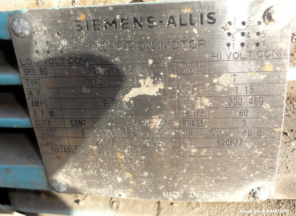 Used Tank, 10,500 Gallon, 304 Stainless Steel, Vertical. Approximate 126" diameter x 192" straight side, flat welded top, slight dished bottom. Fixed carbon steel agitator bridge with a Chemineer agi...
