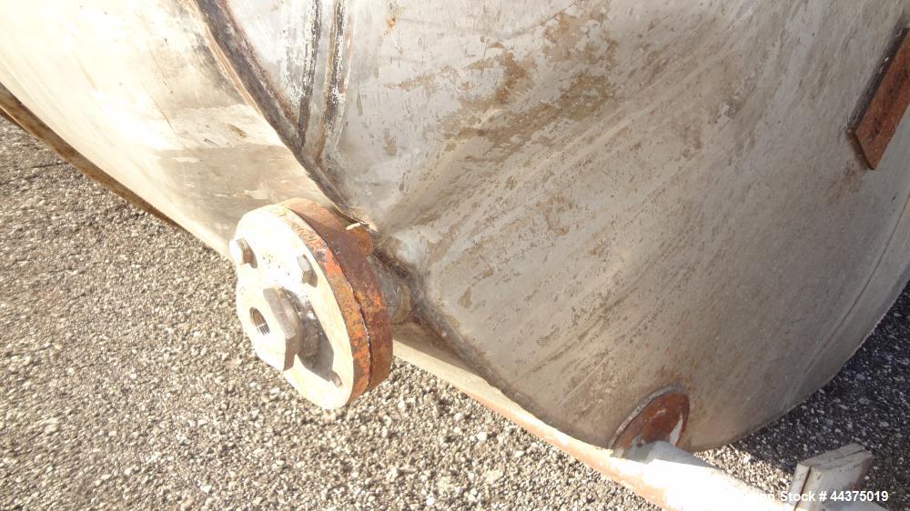 Used Tank, 10,500 Gallon, 304 Stainless Steel, Vertical. Approximate 126" diameter x 192" straight side, flat welded top, slight dished bottom. Fixed carbon steel agitator bridge with a Chemineer agi...