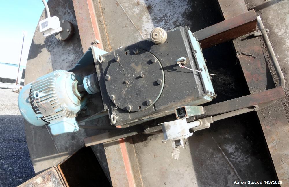Used Imperial Steel Tank, 10,300 Gallon, 304 Stainless Steel, Vertical. Approximate 126" diameter x 192" straight side, flat welded top, dished bottom. Fixed carbon steel agitator bridge with a top e...