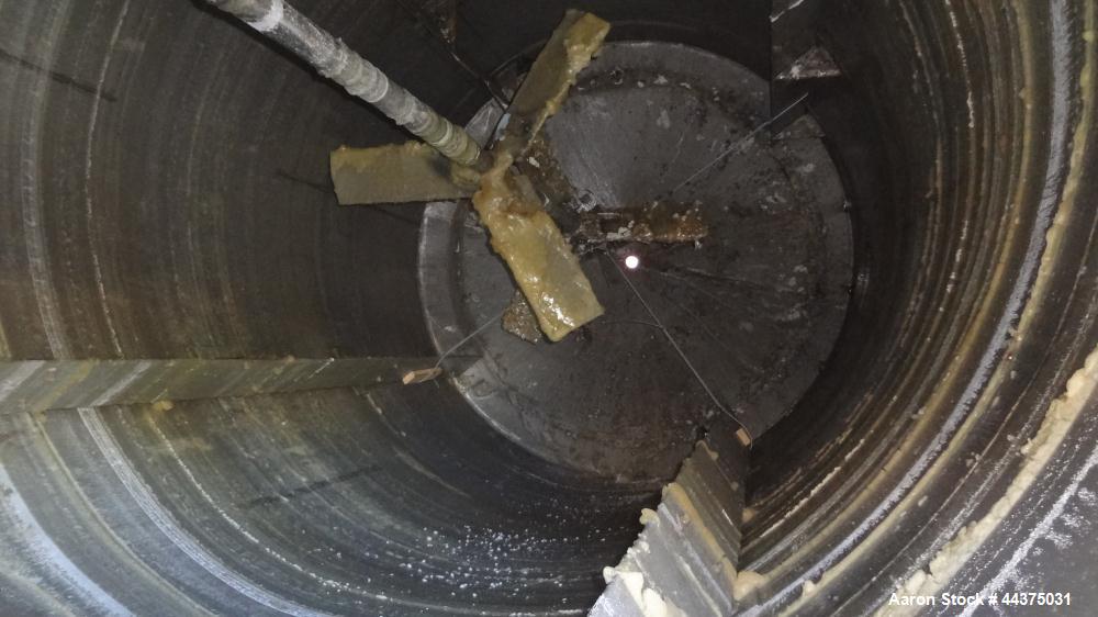 Used Imperial Steel Tank, 10,000 Gallon, 304 Stainless Steel, Vertical. Approximate 120" diameter x 204" straight side, flat welded top, coned bottom. Fixed carbon steel agitator bridge with a top en...