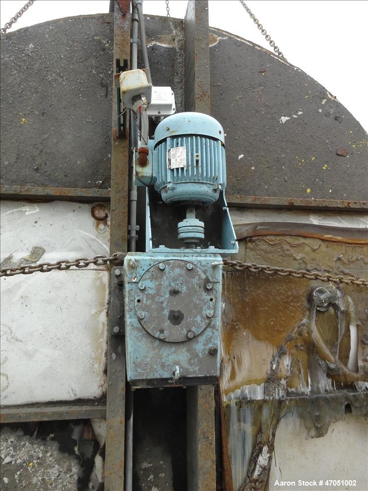 Used Imperial Steel Tank Company Tank, 12,000 Gallon, 304 Stainless Steel, Vertical. Approximate 132" diameter x 204" straight side. Flat top, cone bottom. Fixed carbon steel agitator bridge with a C...