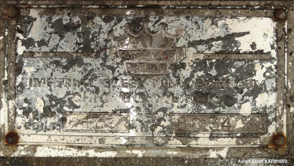 Used Imperial Steel Tank Company Tank, 12,000 Gallon, 304 Stainless Steel, Vertical. Approximate 132" diameter x 204" straight side. Flat top, cone bottom. Fixed carbon steel agitator bridge with a C...