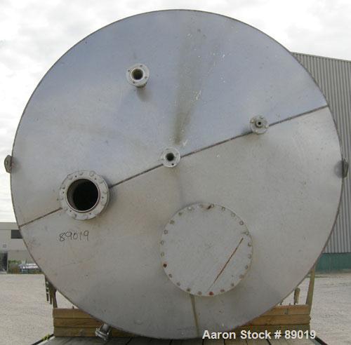 USED: Industrial Marine Inc tank, 6000 gallon, 304 stainless steel, vertical. Approximately 114" diameter x 153" straight side. Slight cone top, flat bottom. Openings: top (2) 2", 3", 10", 24" manway...