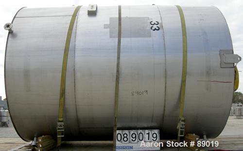USED: Industrial Marine Inc tank, 6000 gallon, 304 stainless steel, vertical. Approximately 114" diameter x 153" straight side. Slight cone top, flat bottom. Openings: top (2) 2", 3", 10", 24" manway...