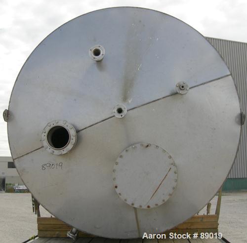USED: Industrial Marine Inc tank, 6000 gallon, 304 stainless steel, vertical. Approximately 114" diameter x 153" straight side. Slight cone top, flat bottom. Openings: top (2) 2", 3", 10", 24" manway...