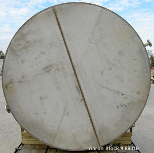 USED: Industrial Marine Inc tank, 6000 gallon, 304 stainless steel, vertical. Approximately 114" diameter x 153" straight side. Slight cone top, flat bottom. Openings: top (2) 2", 3", 10", 24" manway...