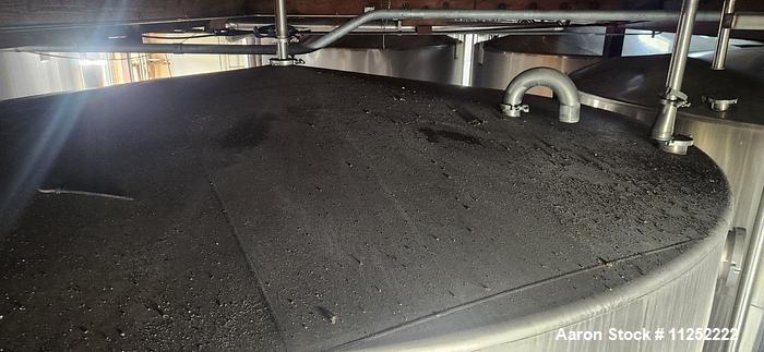 Used- JV Northwest 10,000 Gallon Stainless Steel Tank. Vessel measures 144" diameter x 138" straight side. Slight coned top ...