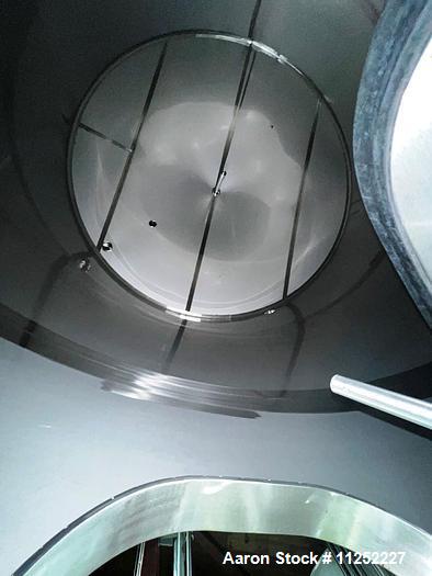 Used-JV Northwest 10,000 Gallon Stainless Steel Tank with cone bottom. Vessel measures 144" diameter x 138" straight side wi...