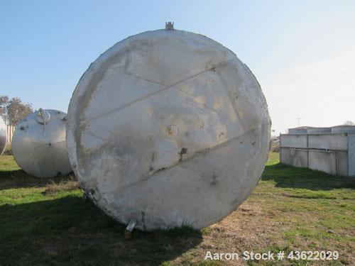 Used Saracco Tank & Mfg Approximately 8,500 Gallon Stainless Steel Storage Tank. Approximately 11' diameter x 12' straight side. Flat bottom and slight cone top. Various top openings including a 17"m...