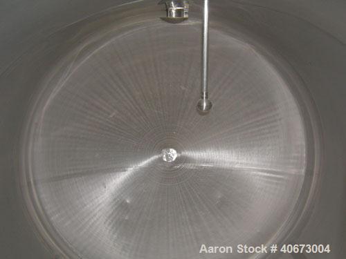Used L'Hoir Incorporated tank, 4803 gallons (4000 Imperial), 304 stainless steel, horizontal. Approximately 94 1/2" diameter x 144" straight side, dished heads. 2 internal CIP spray balls. Top Openin...