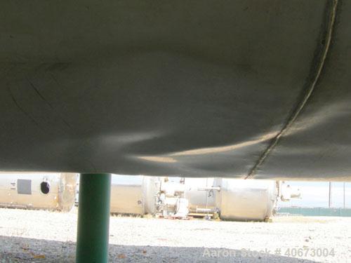 Used L'Hoir Incorporated tank, 4803 gallons (4000 Imperial), 304 stainless steel, horizontal. Approximately 94 1/2" diameter x 144" straight side, dished heads. 2 internal CIP spray balls. Top Openin...