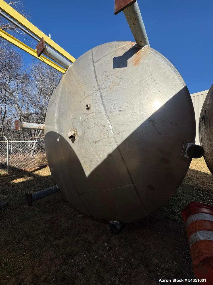 Used Letco Incorporated Approximate 15,000 Gallon Stainless Steel Tank,  Approximate 144" diameter x 216" straight side, dished top & bottom. Mounts on (6) steel legs (2 legs have been cut). Serial# ...