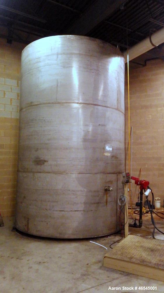 Used Lewis Metals Corp Tank, 7684 Gallon, 304 Stainless Steel, Vertical.  114" Dia. x 174" Straight Side, Flat Top and Flat Bottom, 24" Side Bottom Manway with Cover.  Built in 2001.