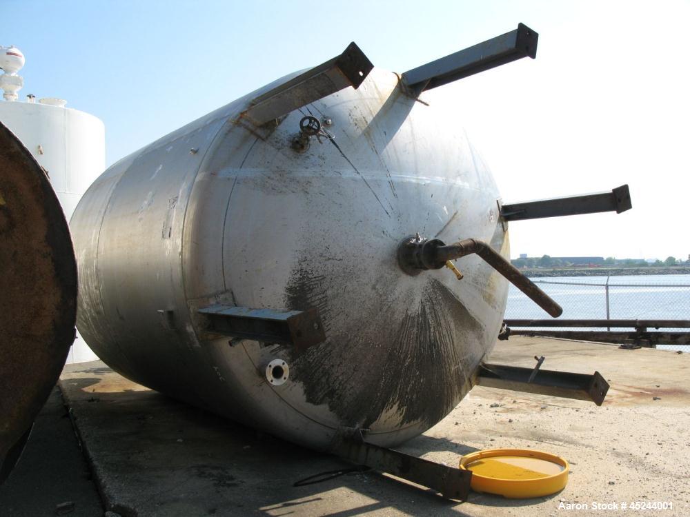 Used Master Craft, 10,000 gallons vertical T304 stainless steel tank, heated with internal pipe coil. Tank is rated for 15 psi at 250 degree F. internal. Has bank of full coil, approximately 10 turns...