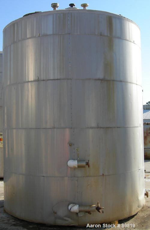 USED: Metal Equipment tank, approximately 7,000 gallons, stainless steel. Insulated. 10' diameter x 12' straight side. Flat bottom, dish top.