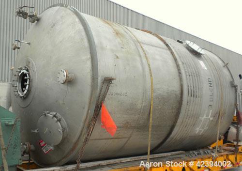 Used Modern Welding Company Tank, 9000 gallon, 304 stainless steel, vertical. Approximate 120" diameter x 184" straight side, dished top, flat bottom. Internal rated 5 psi at 150 deg F. (2) Approxima...