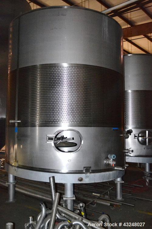 Used Mueller Tank, 6000 Gallon, Model DF, 304 Stainless Steel, Vertical. Approximate 118" diameter x 126" straight side. Off center coned top, sloped bottom. (1) 46” Section of dimple jacket on the s...