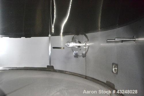 Used Mueller Tank, 6000 Gallon, Model DF, 304 Stainless Steel, Vertical. Approximate 118" diameter x 126" straight side. Off center coned top, sloped bottom. (1) 46” Section of dimple jacket on the s...