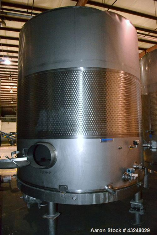 Used Mueller Tank, 6000 Gallon, Model DF, 304 Stainless Steel, Vertical. Approximate 118" diameter x 126" straight side. Off center coned top, sloped bottom. (1) 46” Section of dimple jacket on the s...
