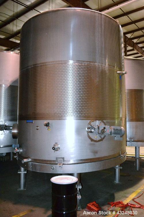 Used Mueller Tank, 6000 Gallon, Model DF, 304 Stainless Steel, Vertical. Approximate 118" diameter x 126" straight side. Off center coned top, sloped bottom. (1) 46” Section of dimple jacket on the s...