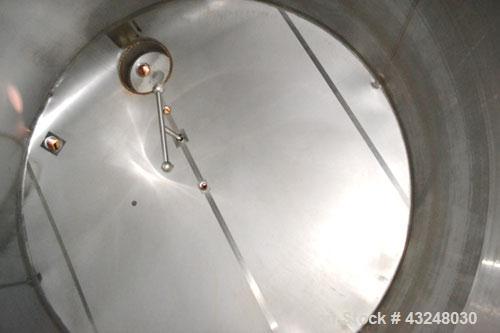 Used Mueller Tank, 6000 Gallon, Model DF, 304 Stainless Steel, Vertical. Approximate 118" diameter x 126" straight side. Off center coned top, sloped bottom. (1) 46” Section of dimple jacket on the s...